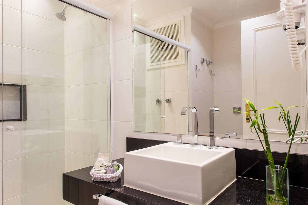 luxury room | bathroom | shower, free toiletries, hair dryer, bathrobes