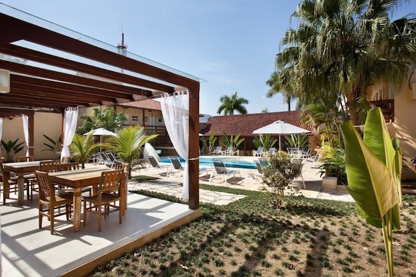 Outdoor pool, pool umbrellas, sun loungers
