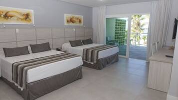 Premium Room, Oceanfront | Minibar, desk, free WiFi, bed sheets
