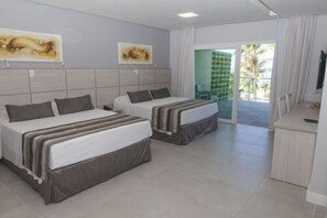 Habitación Premium, frente al mar | Minibar, escritorio, wifi gratis y ropa de cama