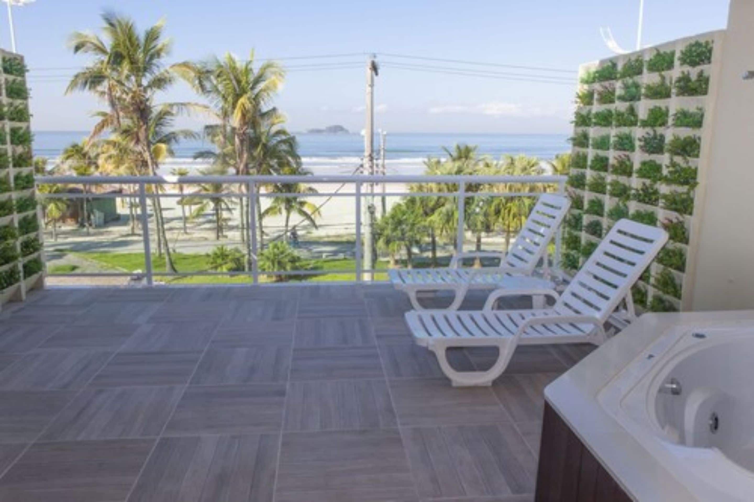 Premium Room, Oceanfront | Minibar, desk, free WiFi, bed sheets