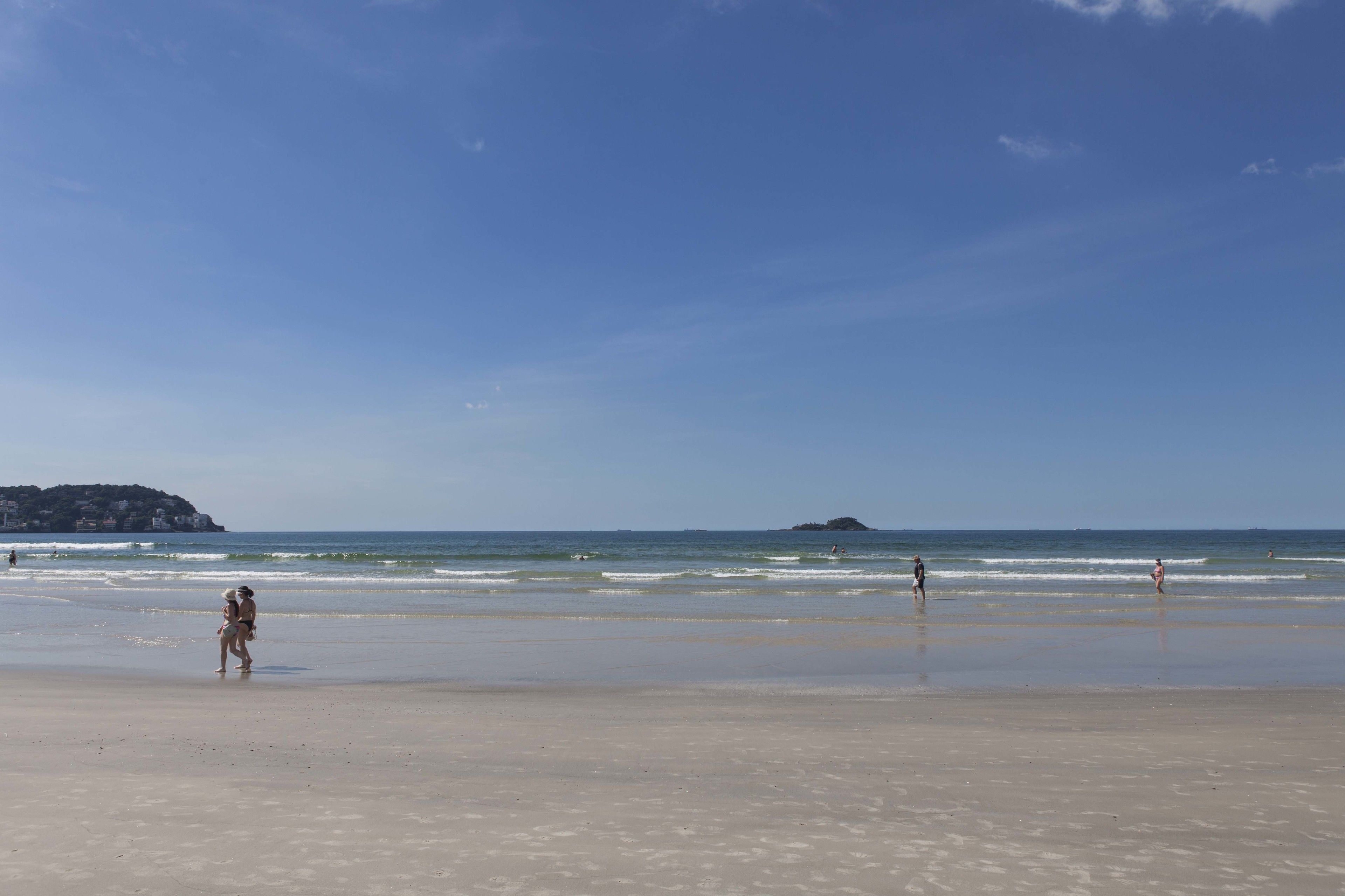 on the beach, sun-loungers, beach umbrellas, beach towels