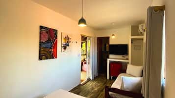 Superior Triple Room | Minibar, individually decorated, individually furnished, blackout drapes