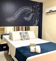 Espacio para trabajar con laptop, wifi gratis y ropa de cama 