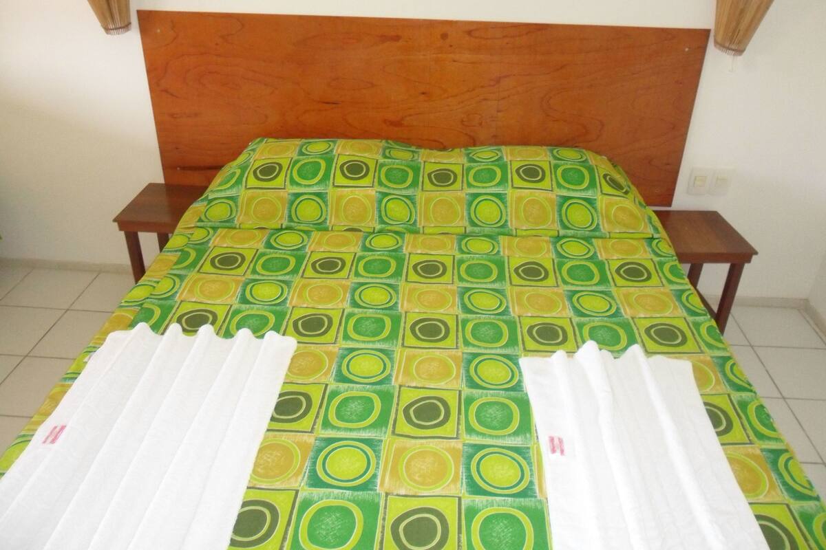 Desk, blackout curtains, iron/ironing board, free cots/infant beds