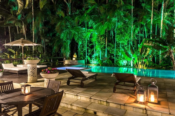 Outdoor pool, open 7 AM to 10 PM, pool umbrellas, sun loungers