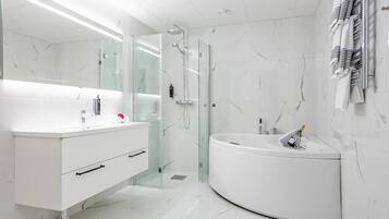 Superior Room, 1 King Bed, Non Smoking, Jetted Tub (with Sofabed) | Bathroom | Eco-friendly toiletries, hair dryer, towels, soap