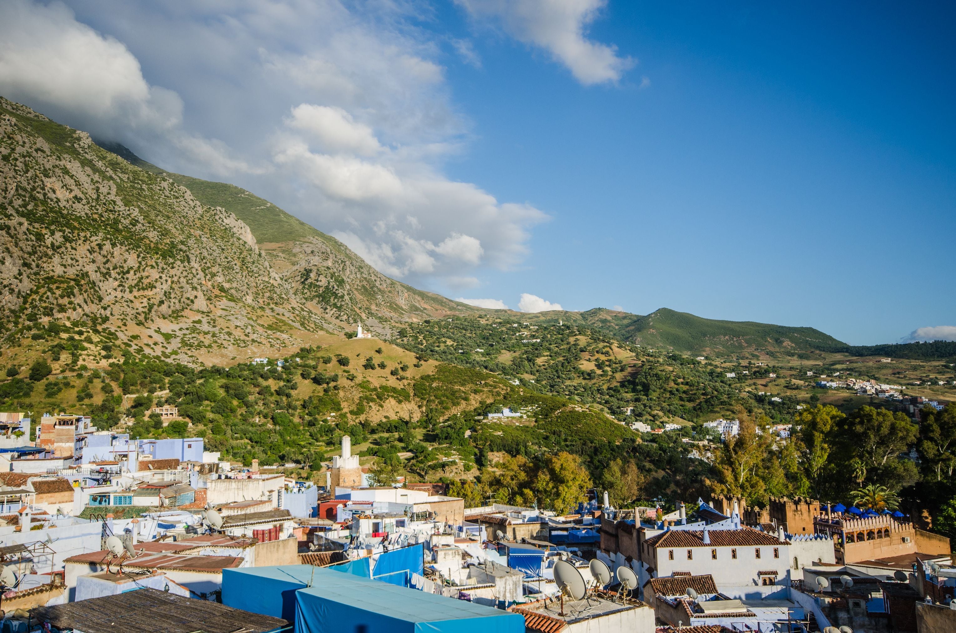 A town with a mosque and residential buildings.