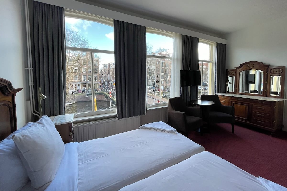 Deluxe Twin Room, Canal View | In-room safe, desk, blackout curtains, free WiFi