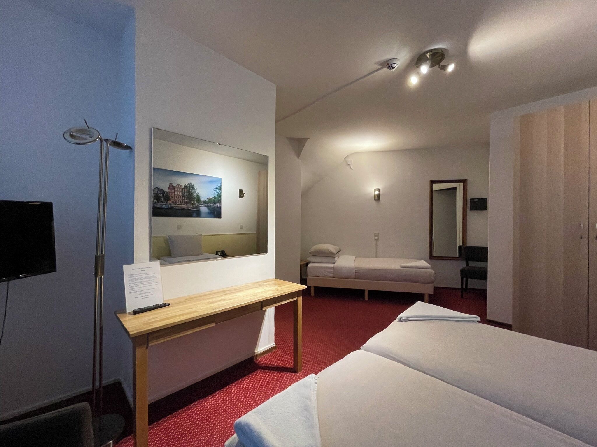 Family Triple Room, City View | In-room safe, desk, blackout curtains, free WiFi