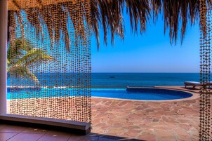 Outdoor pool, pool umbrellas, sun loungers