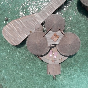 Overwater Family Villa | Minibar, in-room safe, desk, laptop workspace