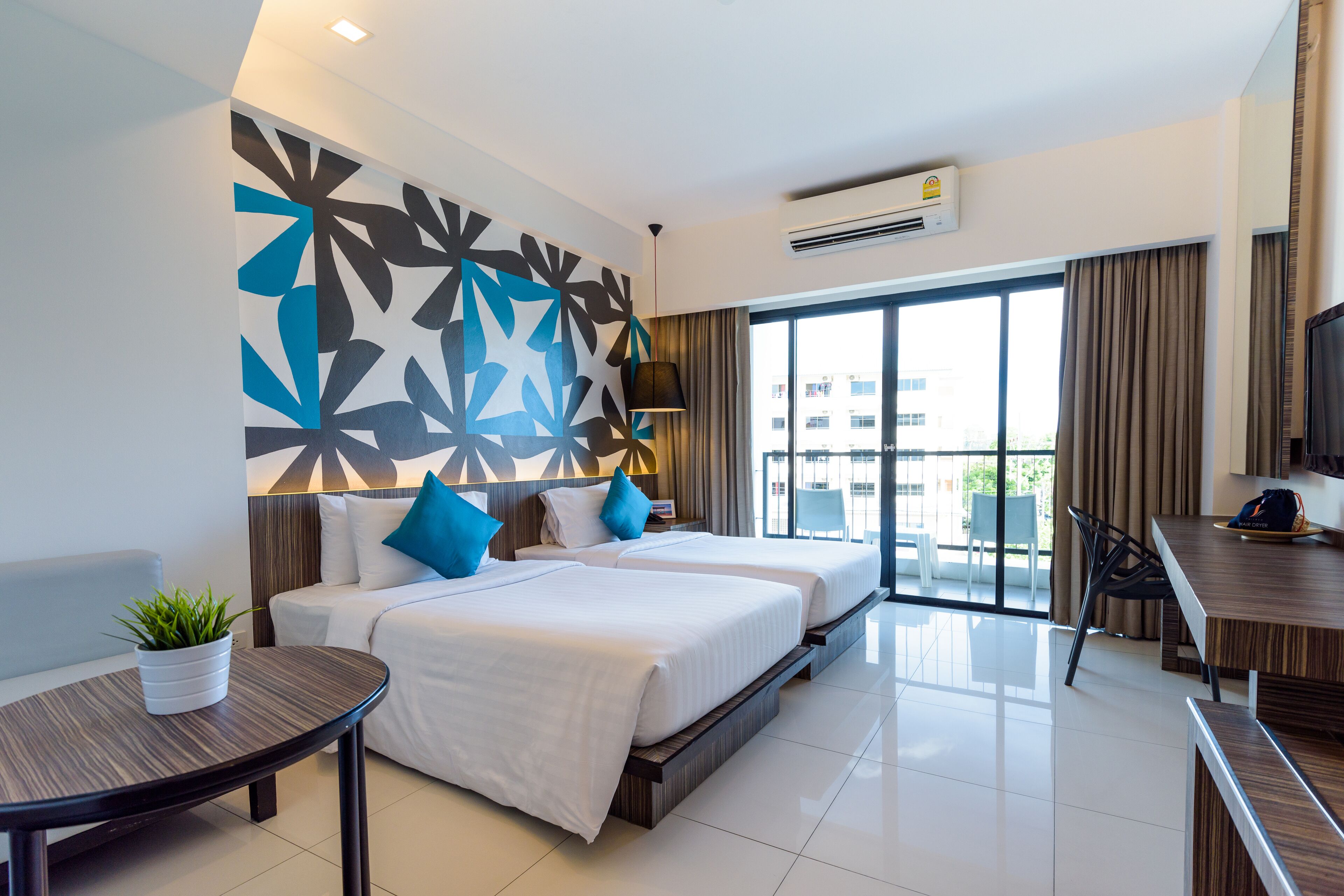 deluxe twin room | in-room safe, desk, blackout curtains, free wifi