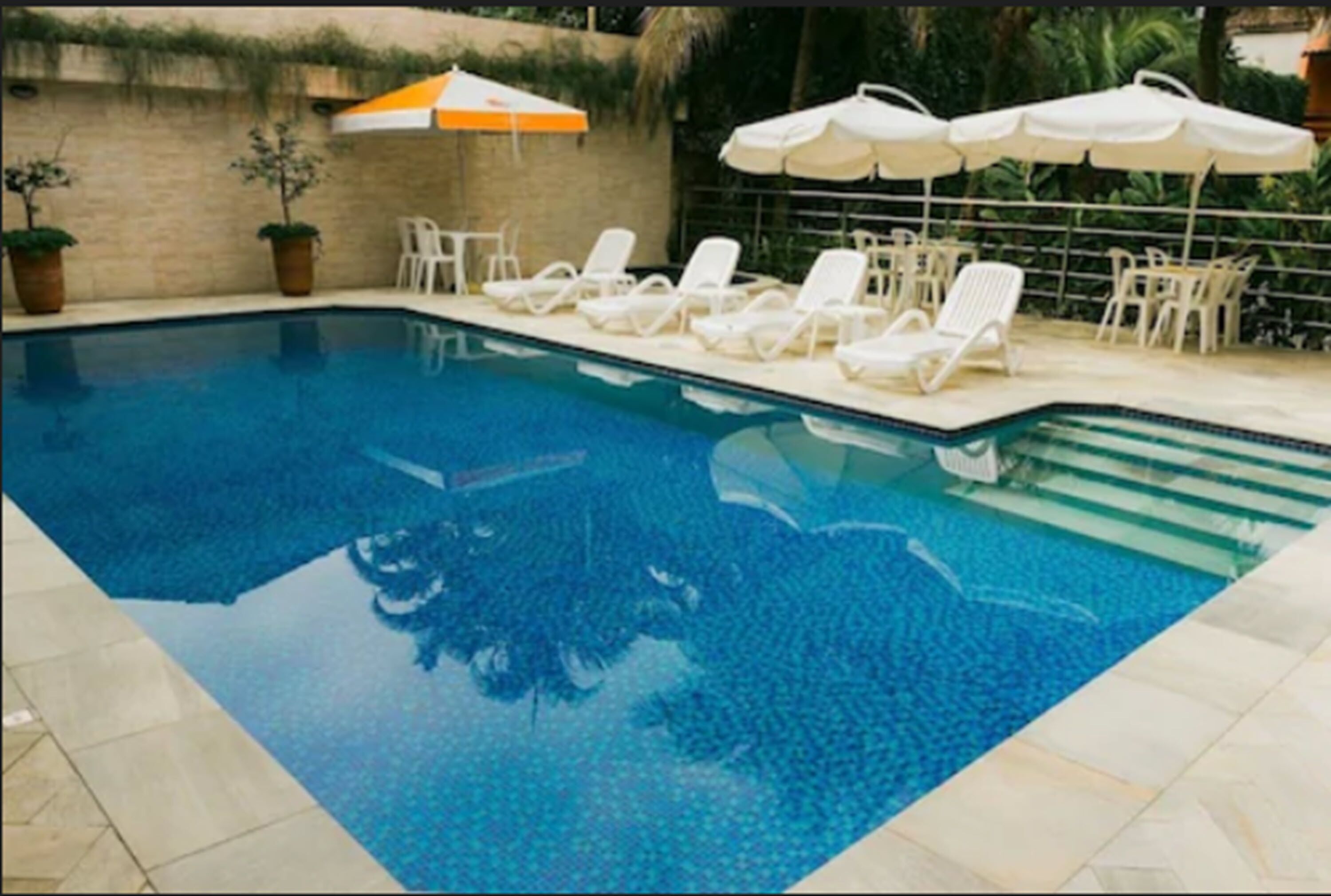 indoor pool, outdoor pool, pool loungers