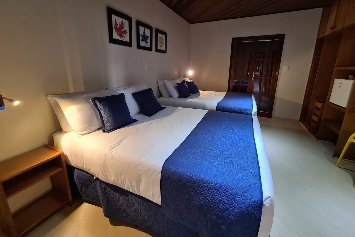 Tripla Deluxe, 1 camera da letto, accessibile ai disabili, vista valle | 3 camere, minibar, tende oscuranti, insonorizzazione