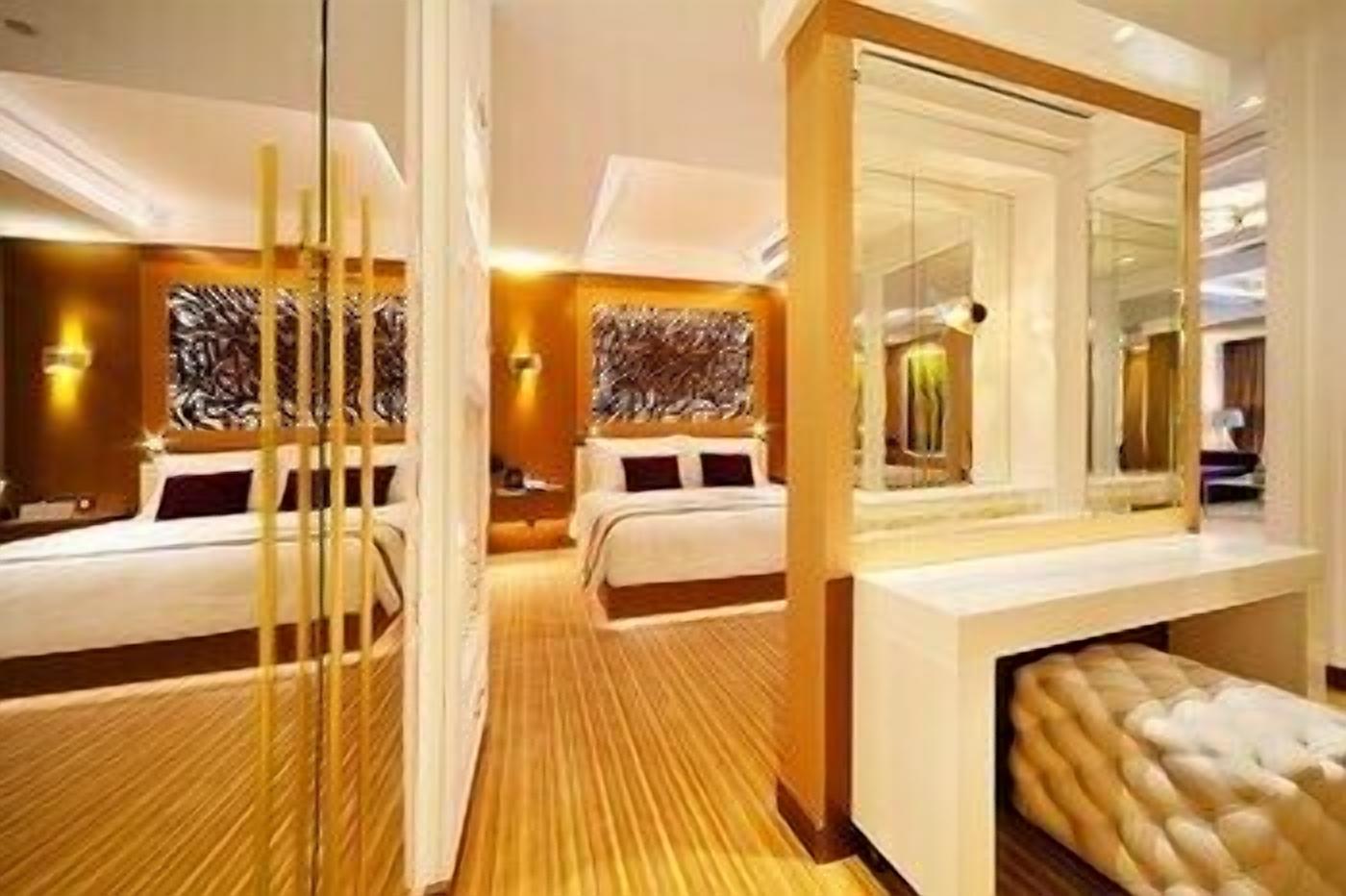 Premium bedding, down comforters, free minibar items, in-room safe