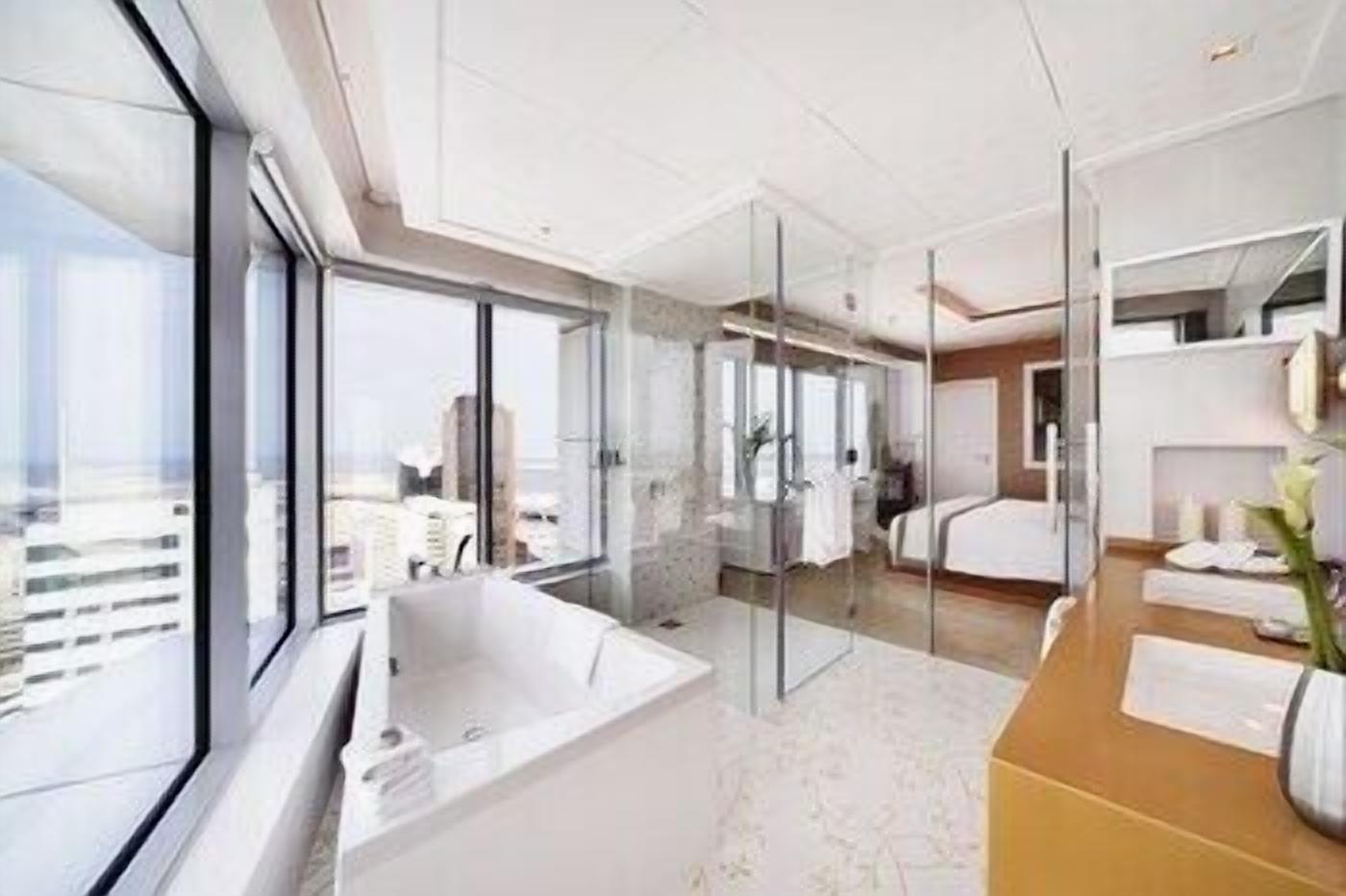 Premium bedding, down comforters, free minibar items, in-room safe