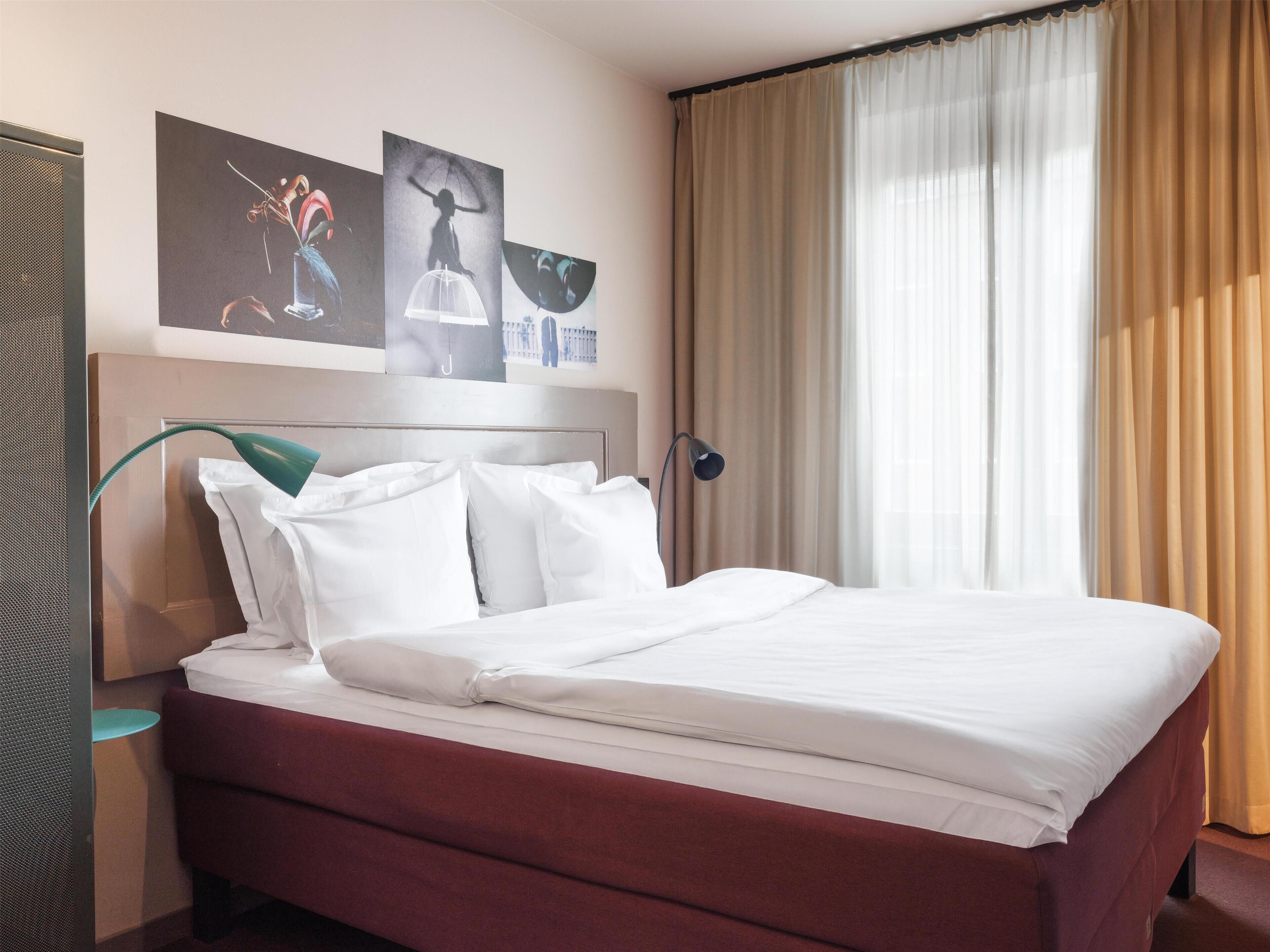 Premium bedding, in-room safe, individually decorated, blackout curtains