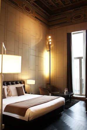 Memory-foam beds, minibar, in-room safe, desk