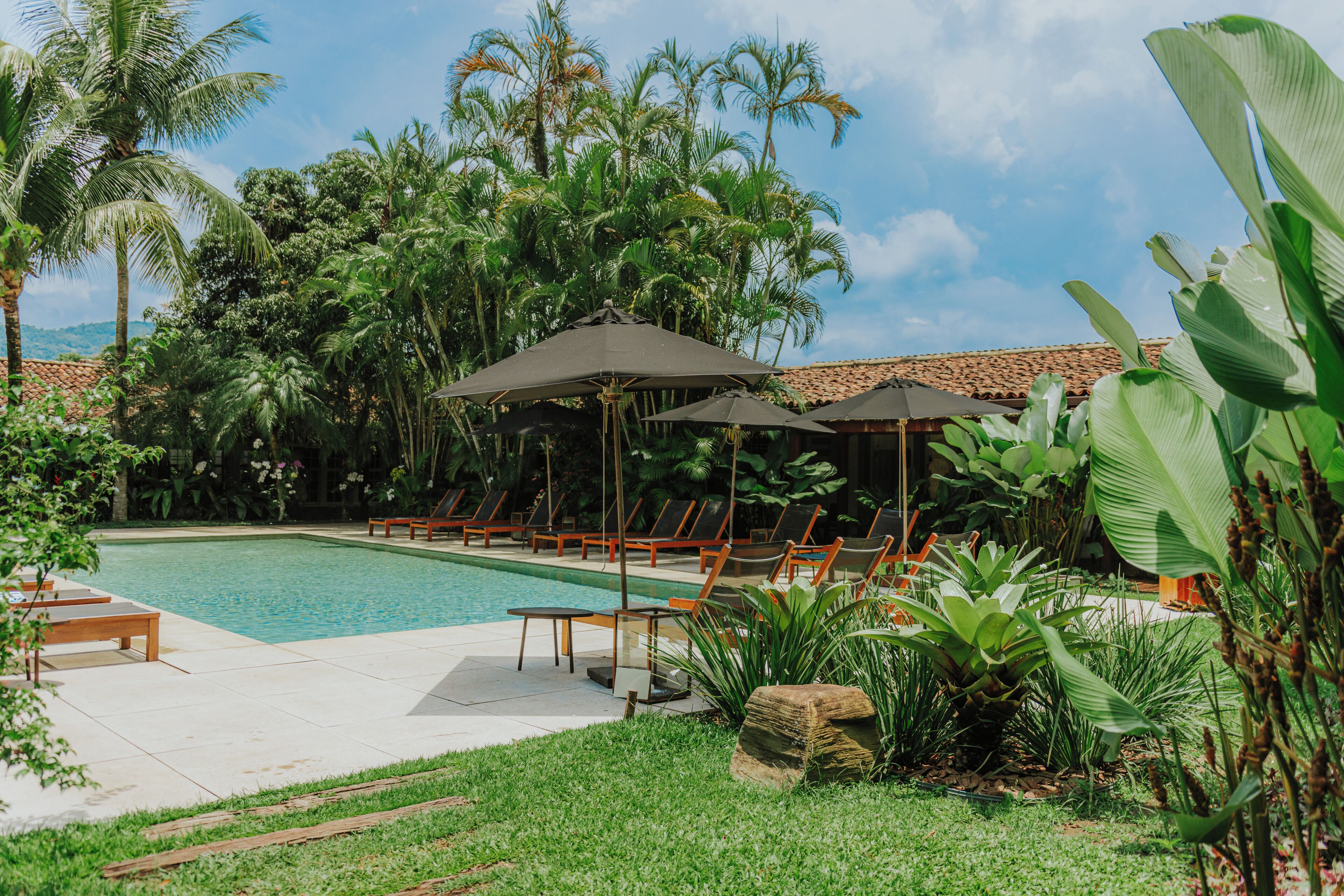 Outdoor pool, pool umbrellas, pool loungers