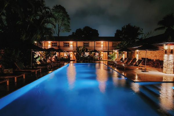 Outdoor pool, pool umbrellas, sun loungers