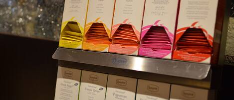 A selection of tea boxes with various flavors and descriptions.