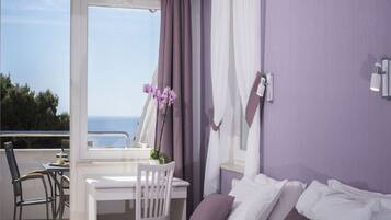 Studio, Balcony, Sea View | 1 bedroom, iron/ironing board, free WiFi, bed sheets