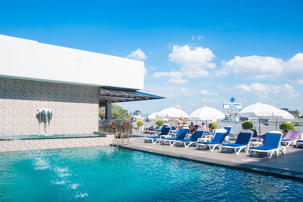 2 outdoor pools, pool umbrellas, pool loungers
