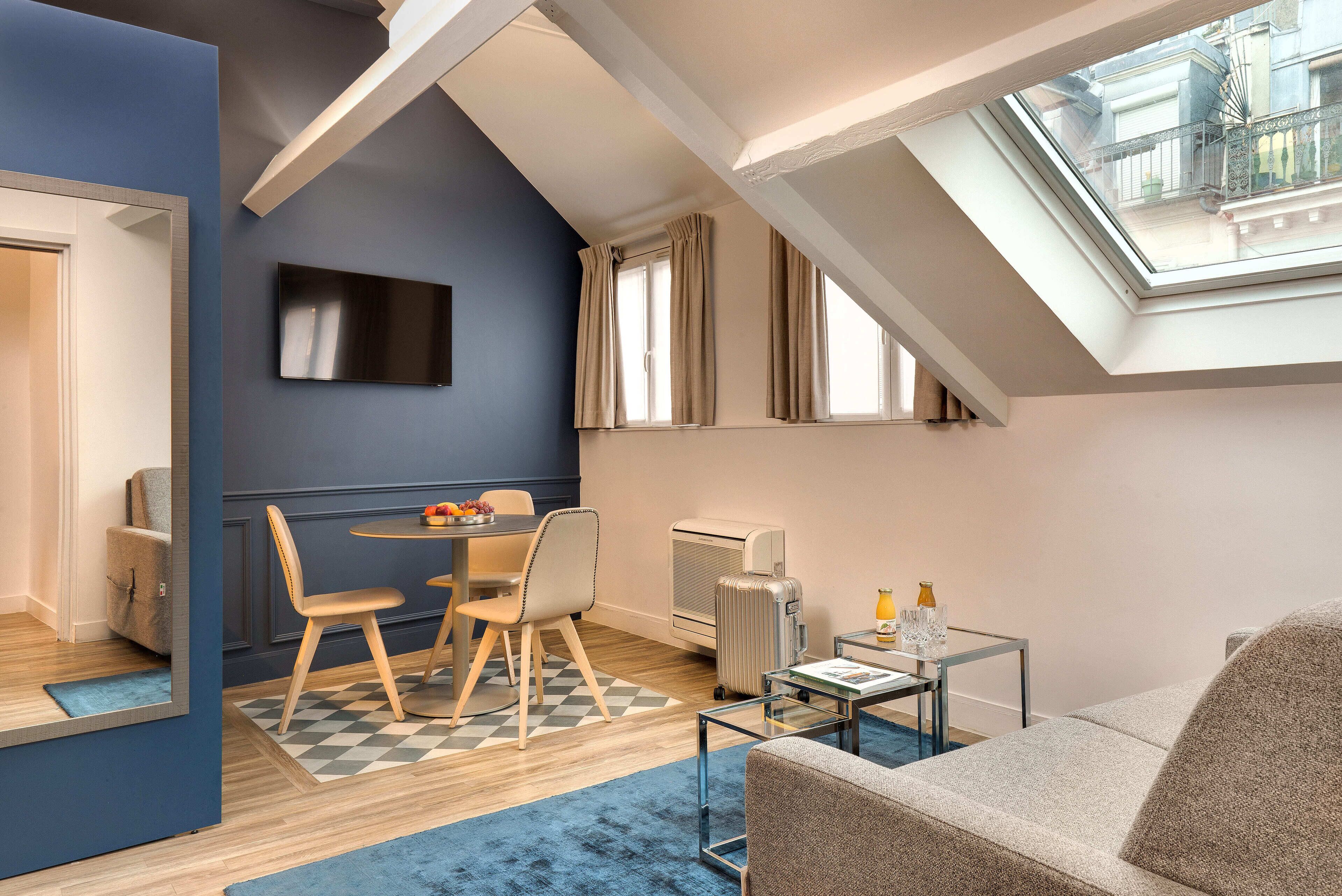 Appartement Privilège | Coin séjour | Télévision à écran plat