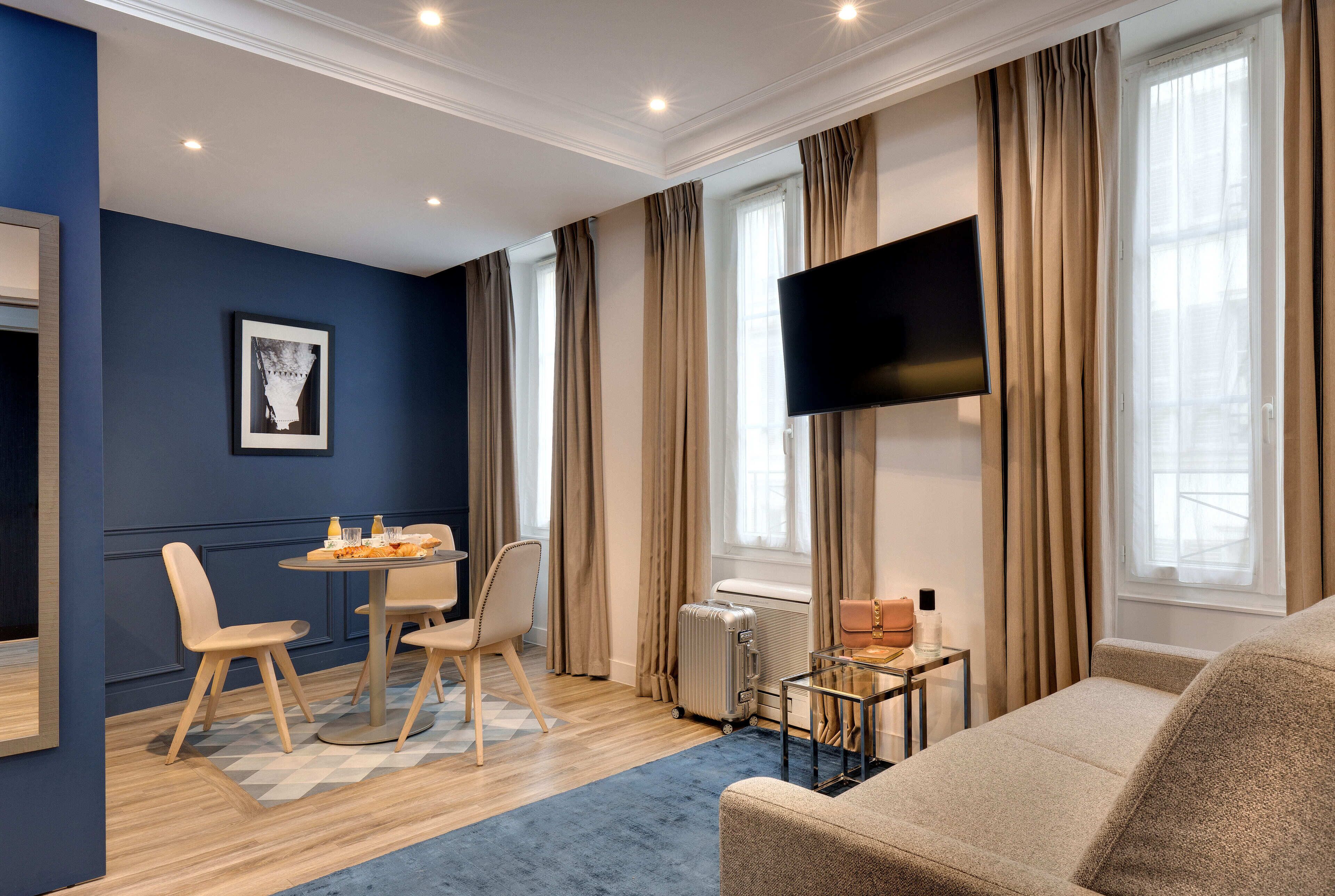 Appartement Privilège | Coin séjour | Télévision à écran plat