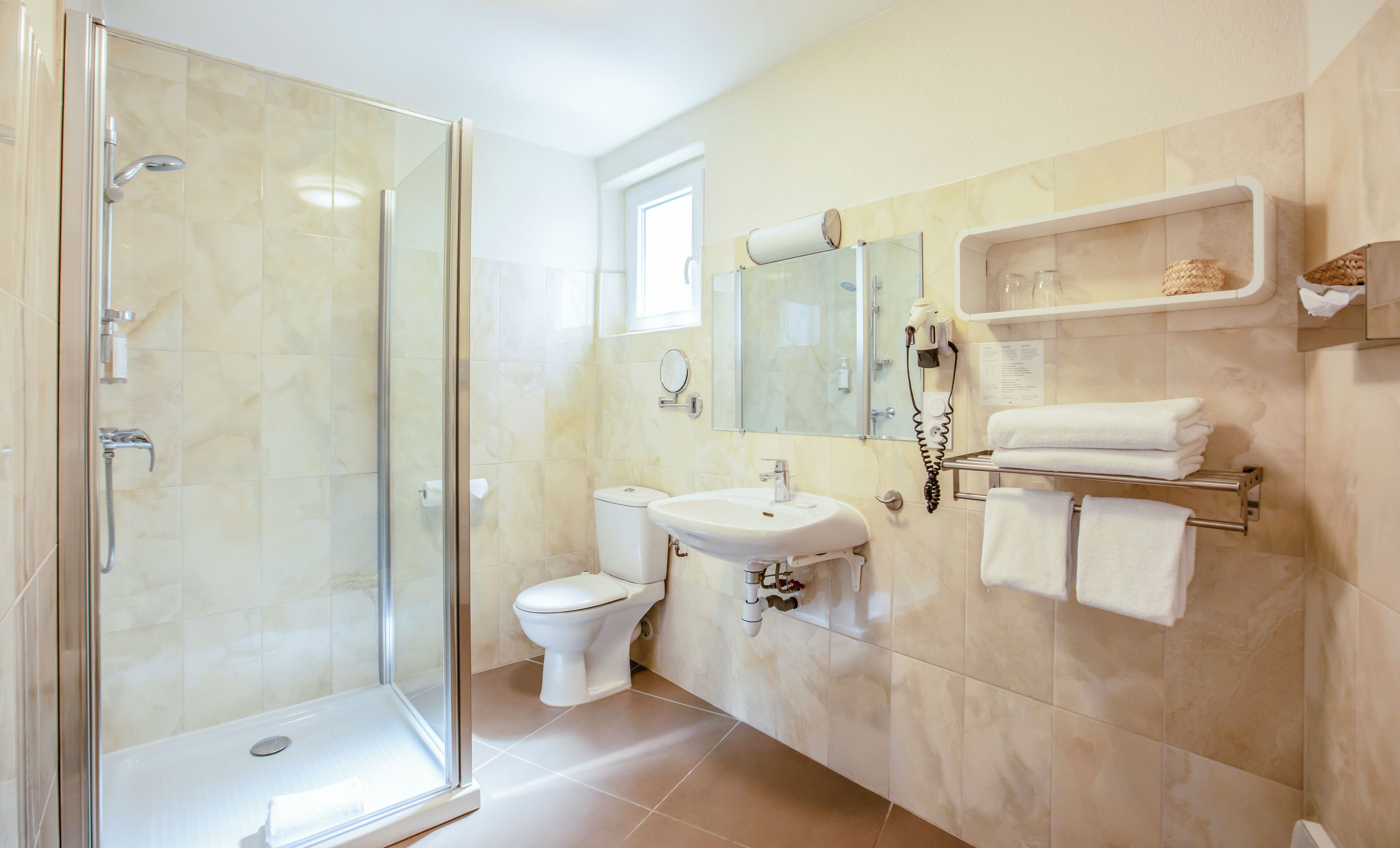 room, garden view | bathroom | free toiletries, towels