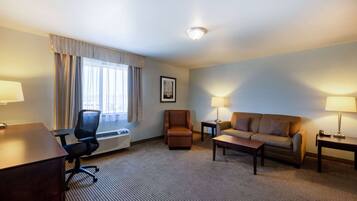 Suite, 1 King Bed, Non Smoking | In-room safe, desk, iron/ironing board, free cots/infant beds