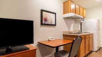 Individually furnished, desk, laptop workspace, iron/ironing board