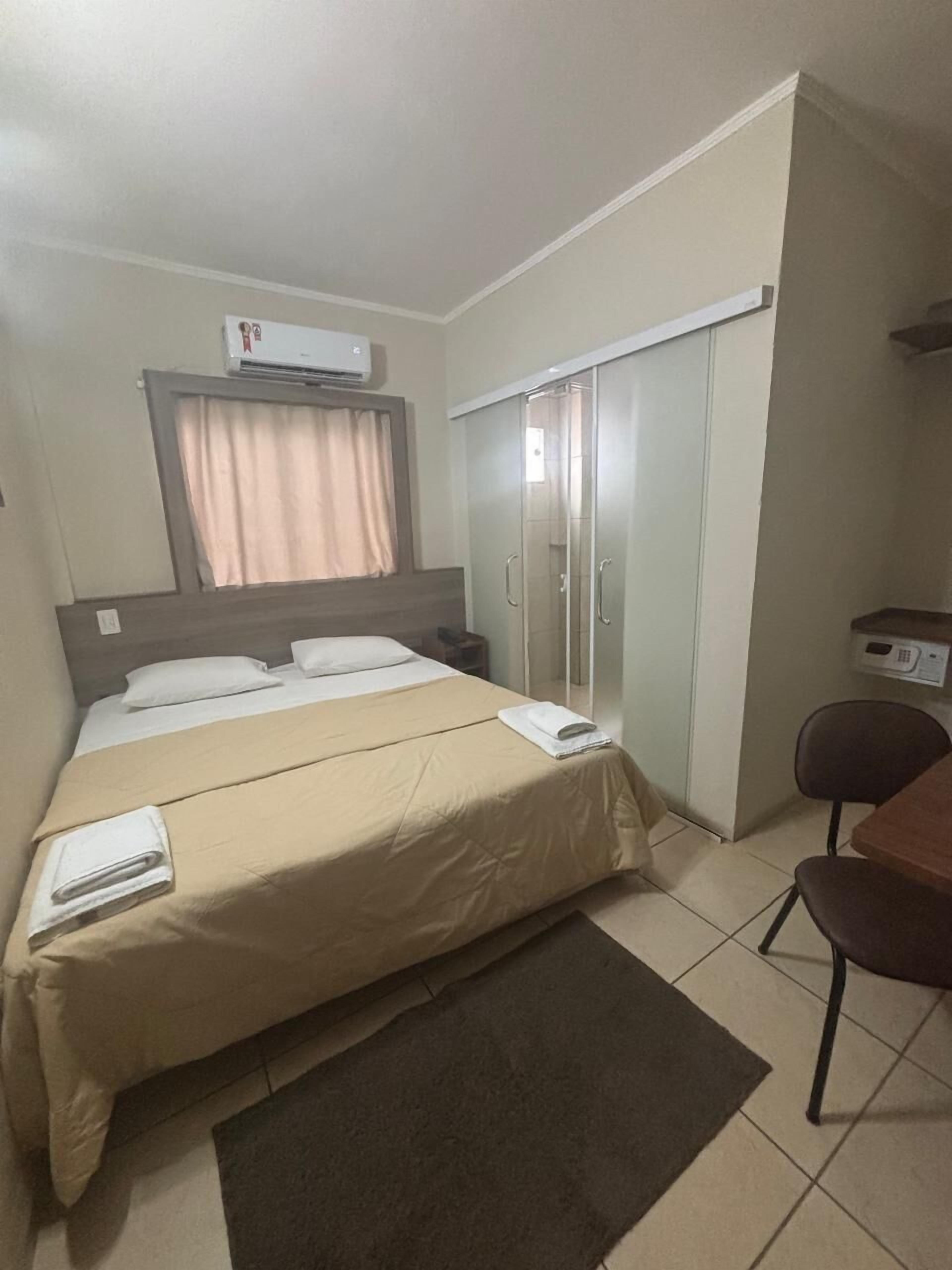 Standard Double or Twin Room, 1 Double or 2 Single Beds | Minibar, in-room safe, desk, blackout curtains