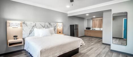Deluxe Studio Suite, 1 King Bed, Kitchenette | 1 bedroom, blackout drapes, iron/ironing board, cribs/infant beds