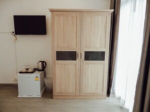 Deluxe Double Room, Balcony | Television
