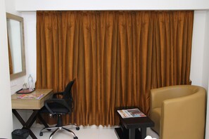 In-room safe, desk, soundproofing, bed sheets - Vinayaga by Poppys  Kumbakonam (Kumbakonam)