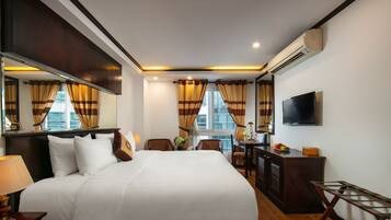 Deluxe Double Room, Balcony | Minibar, in-room safe, desk, laptop workspace