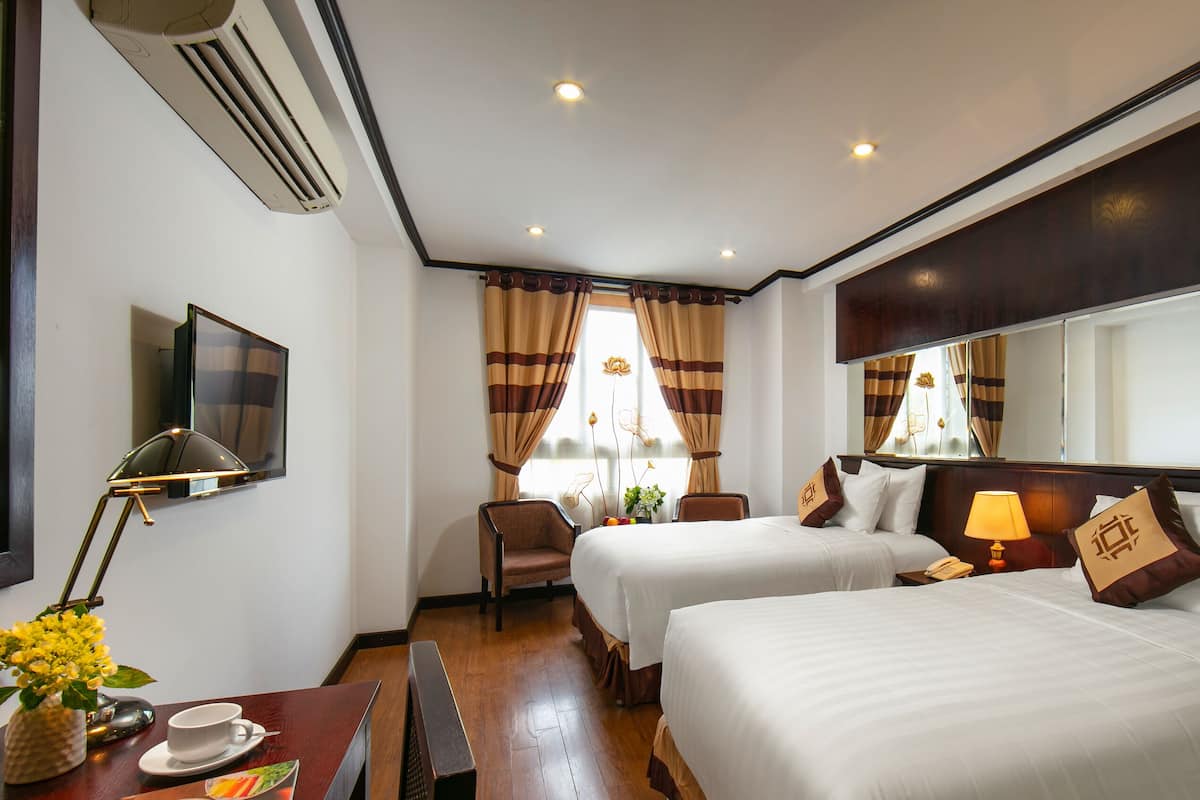 Deluxe Double or Twin Room | Minibar, in-room safe, desk, laptop workspace