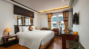Deluxe Double Room, Balcony | Minibar, in-room safe, desk, laptop workspace - Babylon Grand Hotel & Spa (Hanoi)