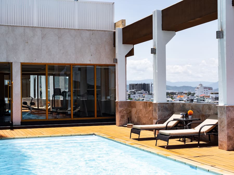 Outdoor pool, pool umbrellas, sun loungers