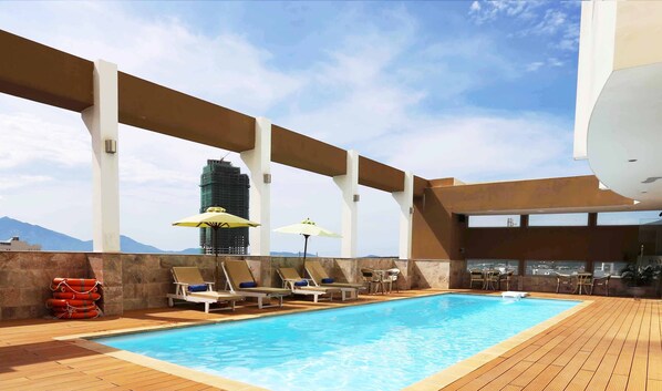 Outdoor pool, pool umbrellas, pool loungers