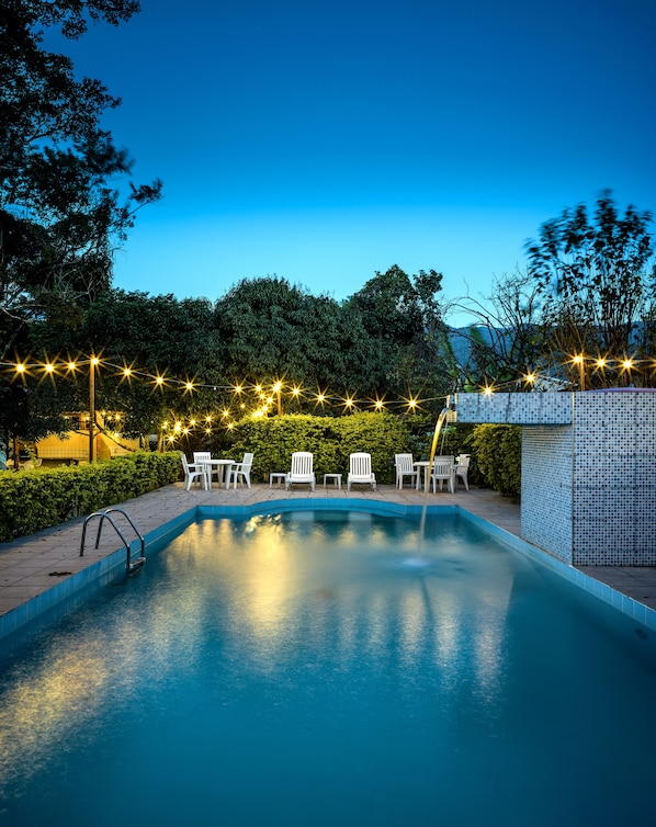 Outdoor pool, open 8:30 AM to 7:30 PM, pool loungers