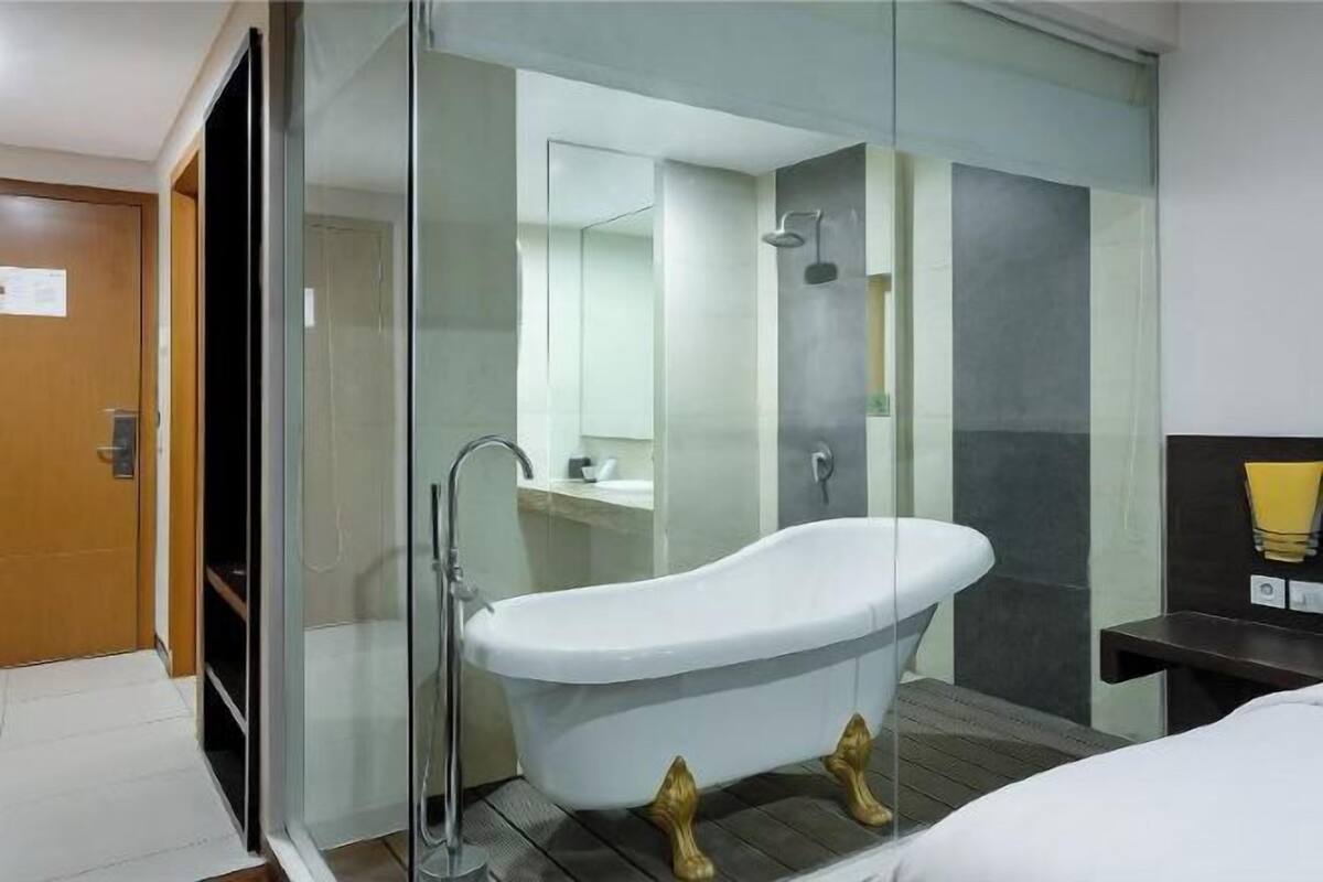 Bathroom | Shower, free toiletries, hair dryer, bathrobes