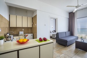 Apartment, 1 Bedroom, Sea View | In-room safe, soundproofing, iron/ironing board, free WiFi