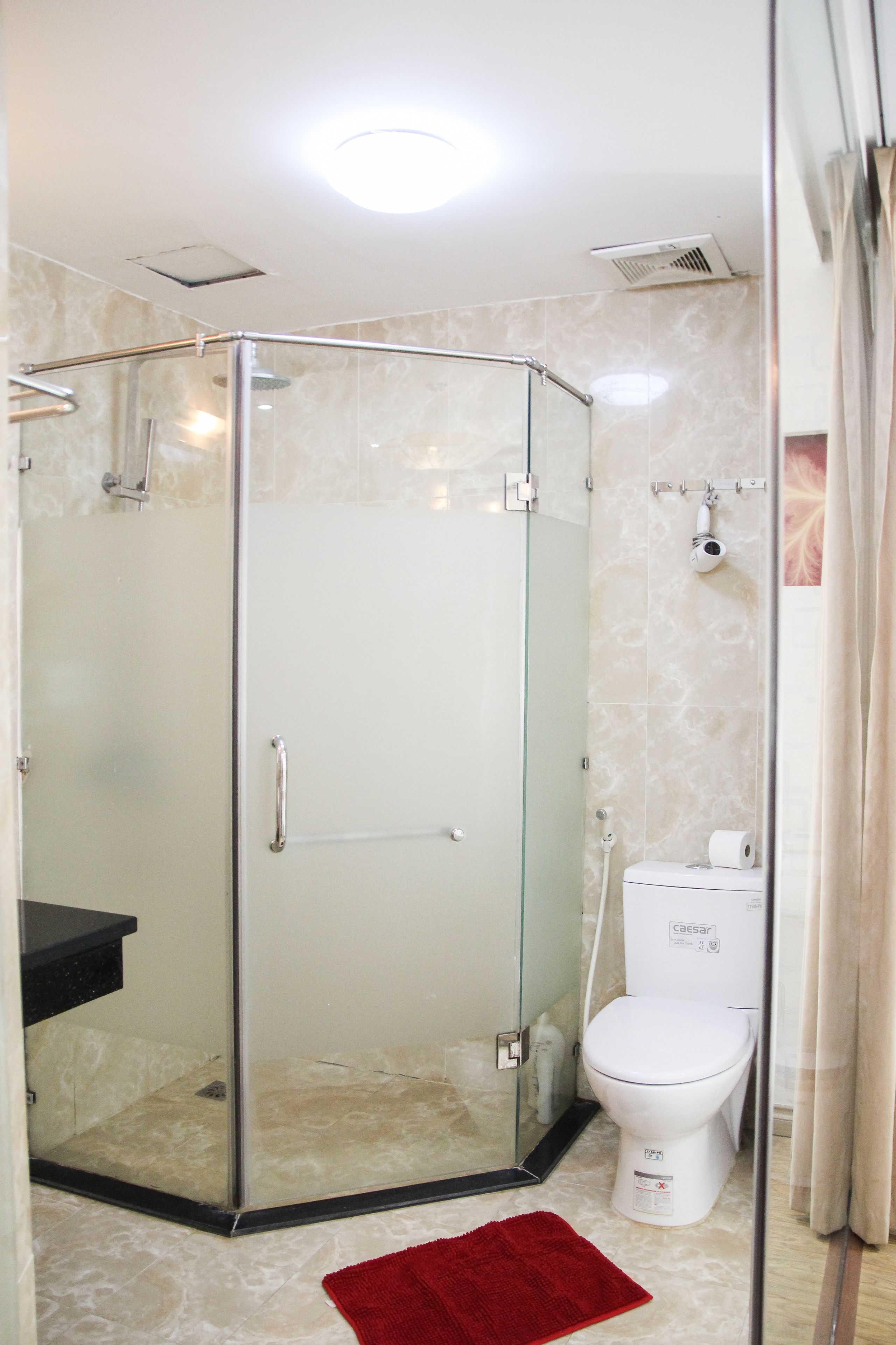 shower, rainfall showerhead, designer toiletries, hair dryer