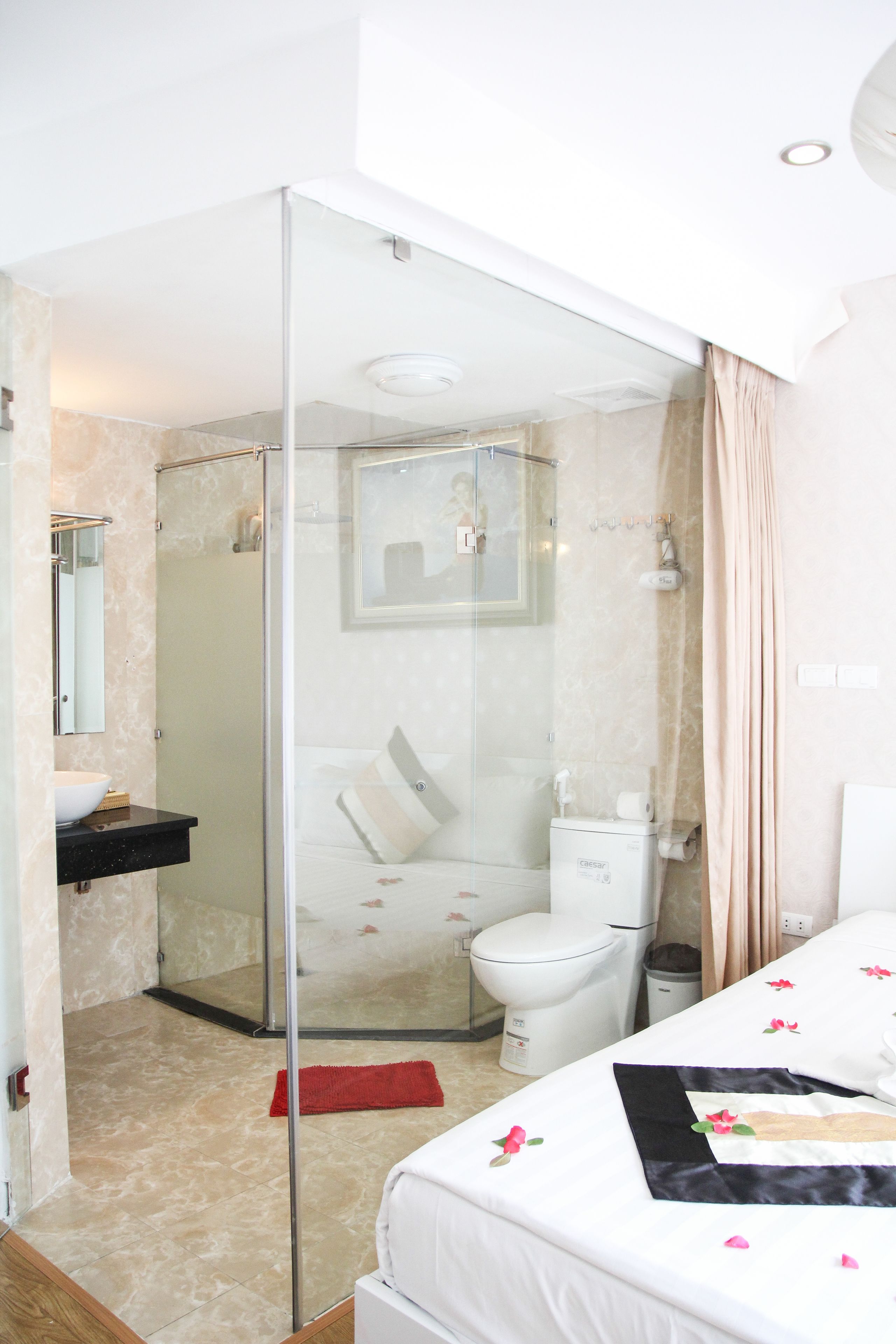 shower, rainfall showerhead, designer toiletries, hair dryer