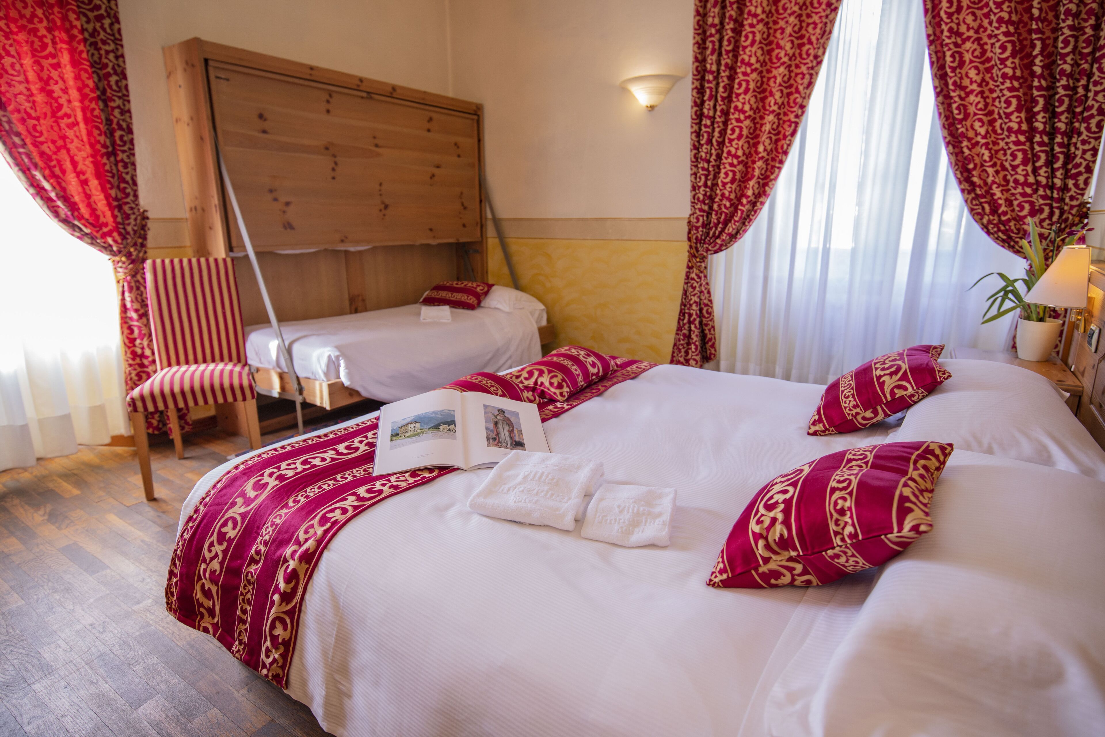 triple room, multiple beds | minibar, in-room safe, desk, blackout curtains