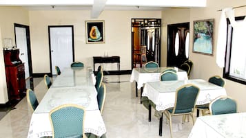 Breakfast, lunch served; local and international cuisine, garden views