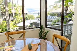 Premium Room, Kitchenette, Partial Sea View | Living area | 65-inch TV with satellite channels